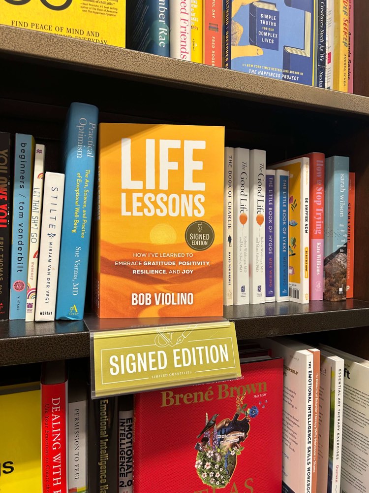 Signed edition of Life Lessons by Bob Violino displayed face-out on a Barnes & Noble shelf